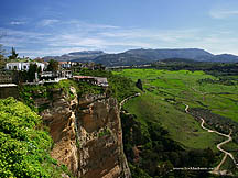 The lush green valley below the town of Ronda, as seen from the Alameda del Tajo Park